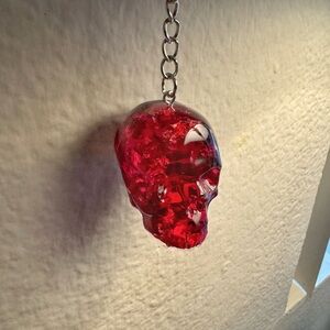 Crimson clear medium skull keychain with rose gold foil inside, customizable.